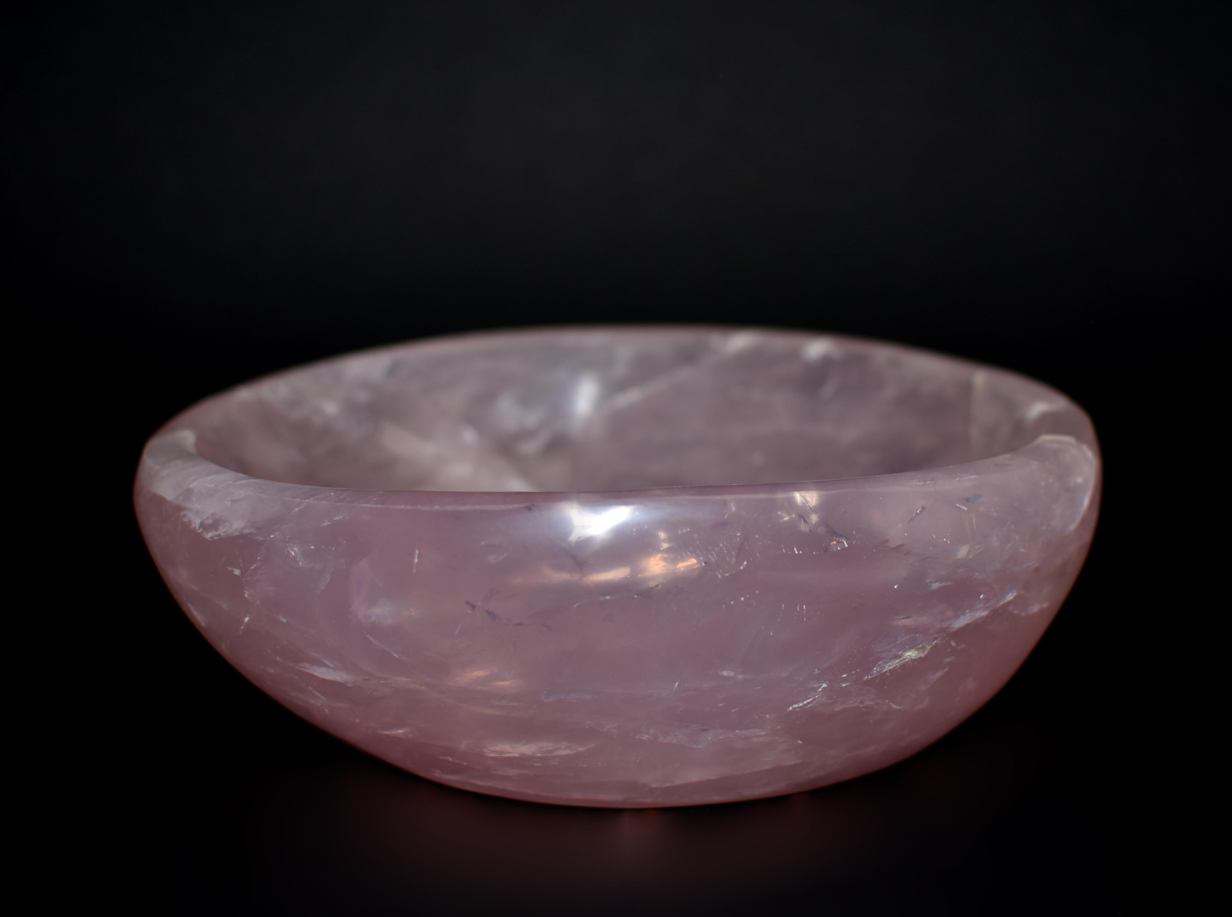 A beautiful large rose quartz bowl weighing 5.4 lbs. Of ovoid form with smooth edge and inside out, stone of the highest quality grade AAA rose quartz. All natural gemstone, hand crafted and polished. Stunning color and iridescence. Rose quartz is a