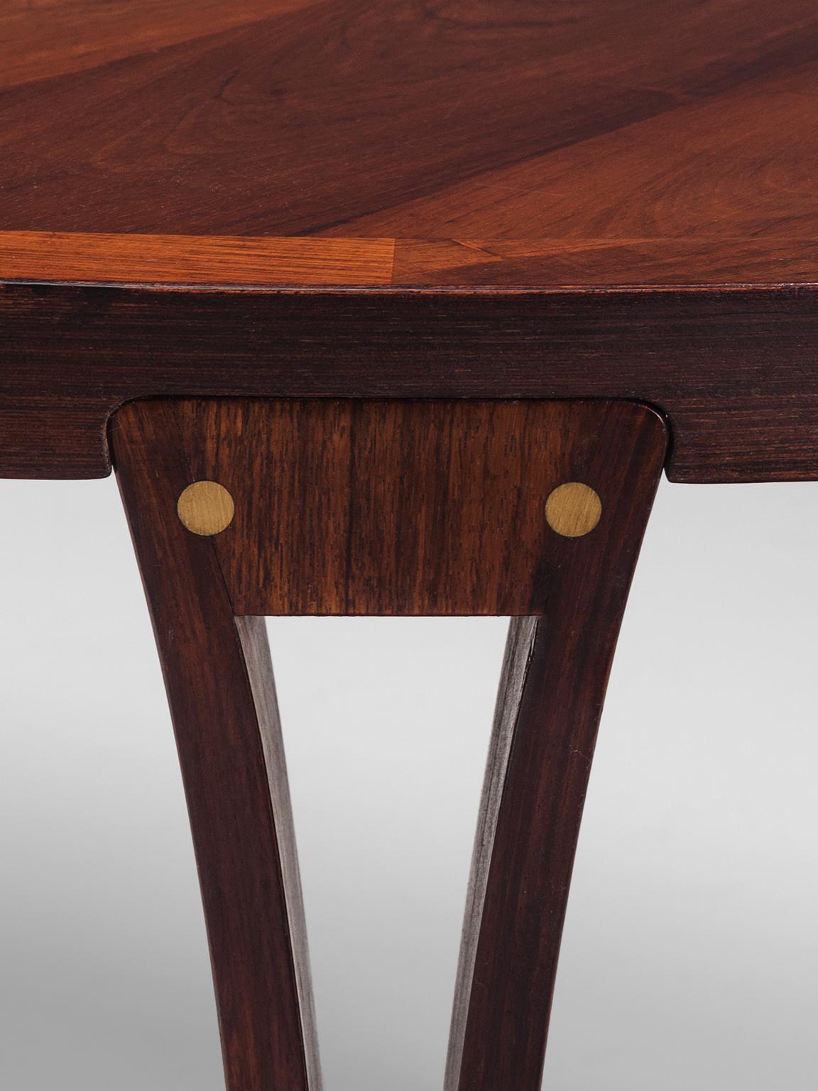 Oval Rosewood Dining Table with Brass Details 1