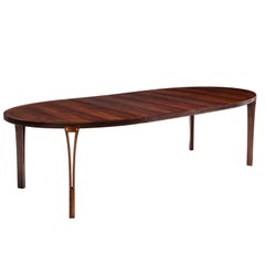Oval Rosewood Dining Table with Brass Details