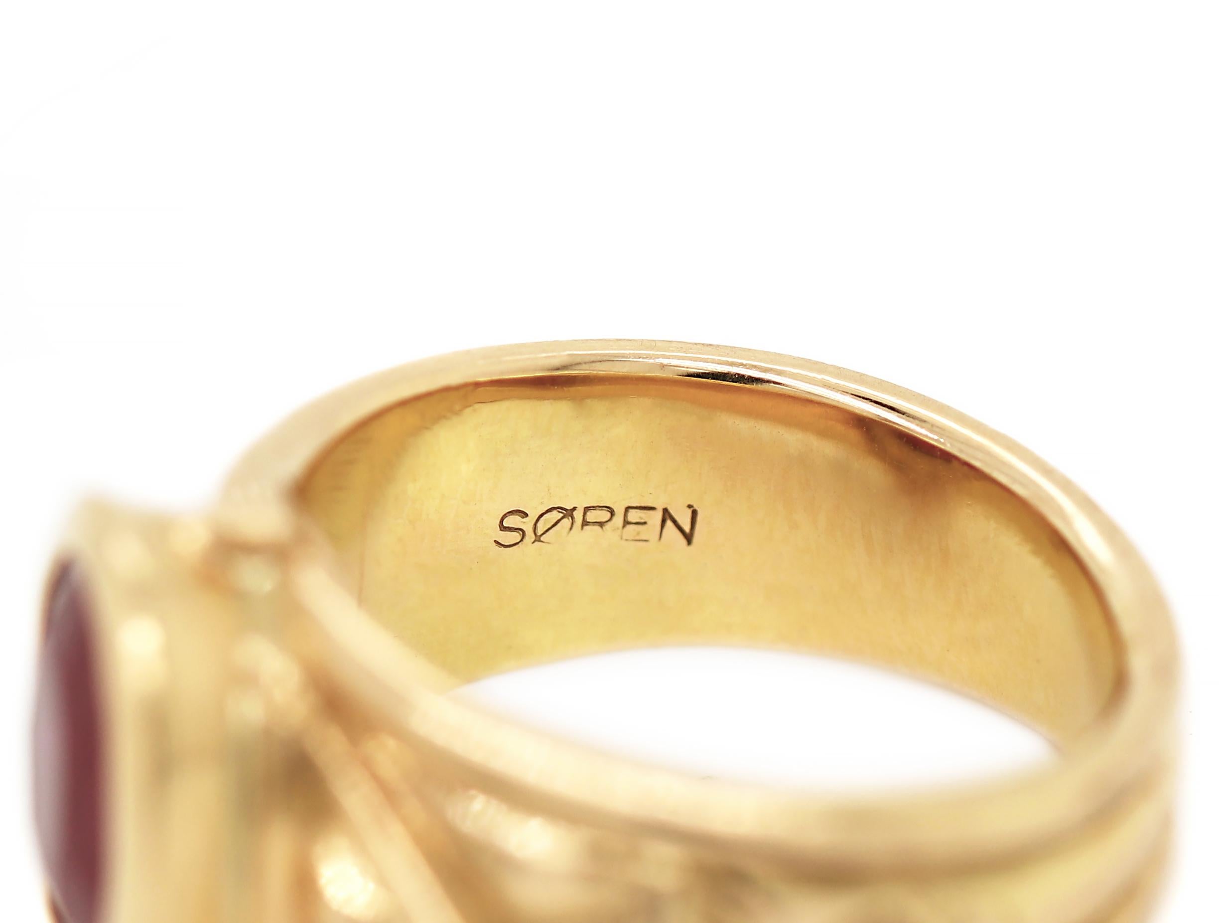 Anillo geométrico de oro amarillo de 18 quilates con rubí ovalado Corte oval en venta