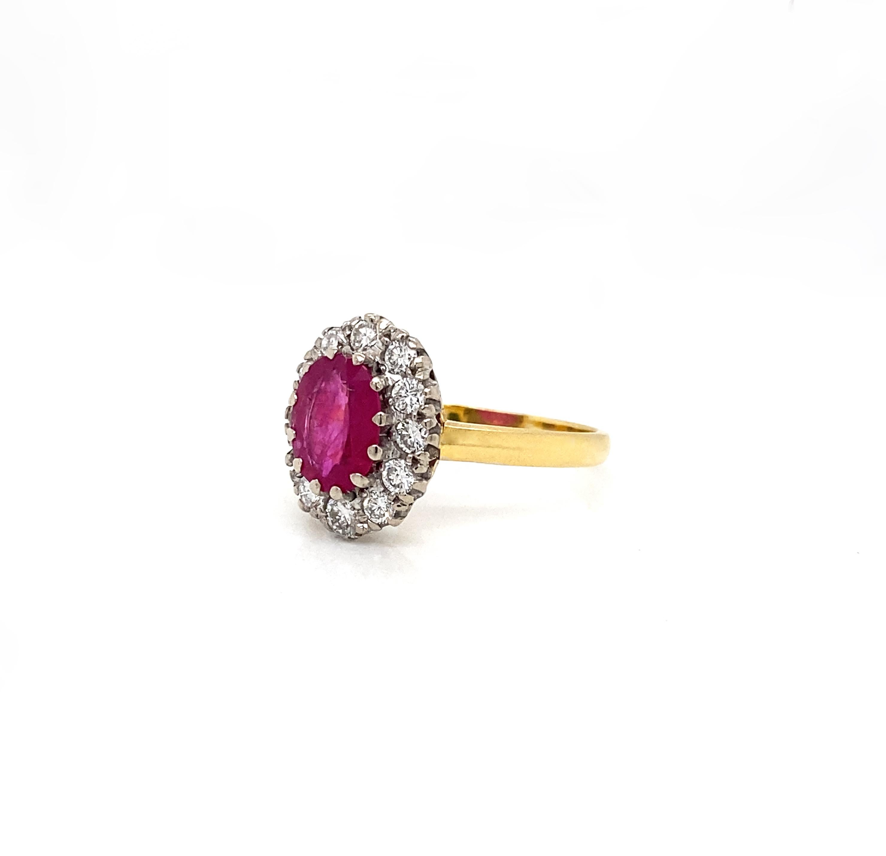 This gorgeous 18 carat gold, ruby and diamond cluster ring is sublime.

The focal point of this engagement ring is a captivating lively red oval shaped ruby, weighing an estimated 1.30 carats, and expertly mounted in a twelve claw, open back