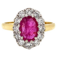 Oval Ruby and Diamond 18 Carat White and Yellow Gold Cluster Engagement Ring