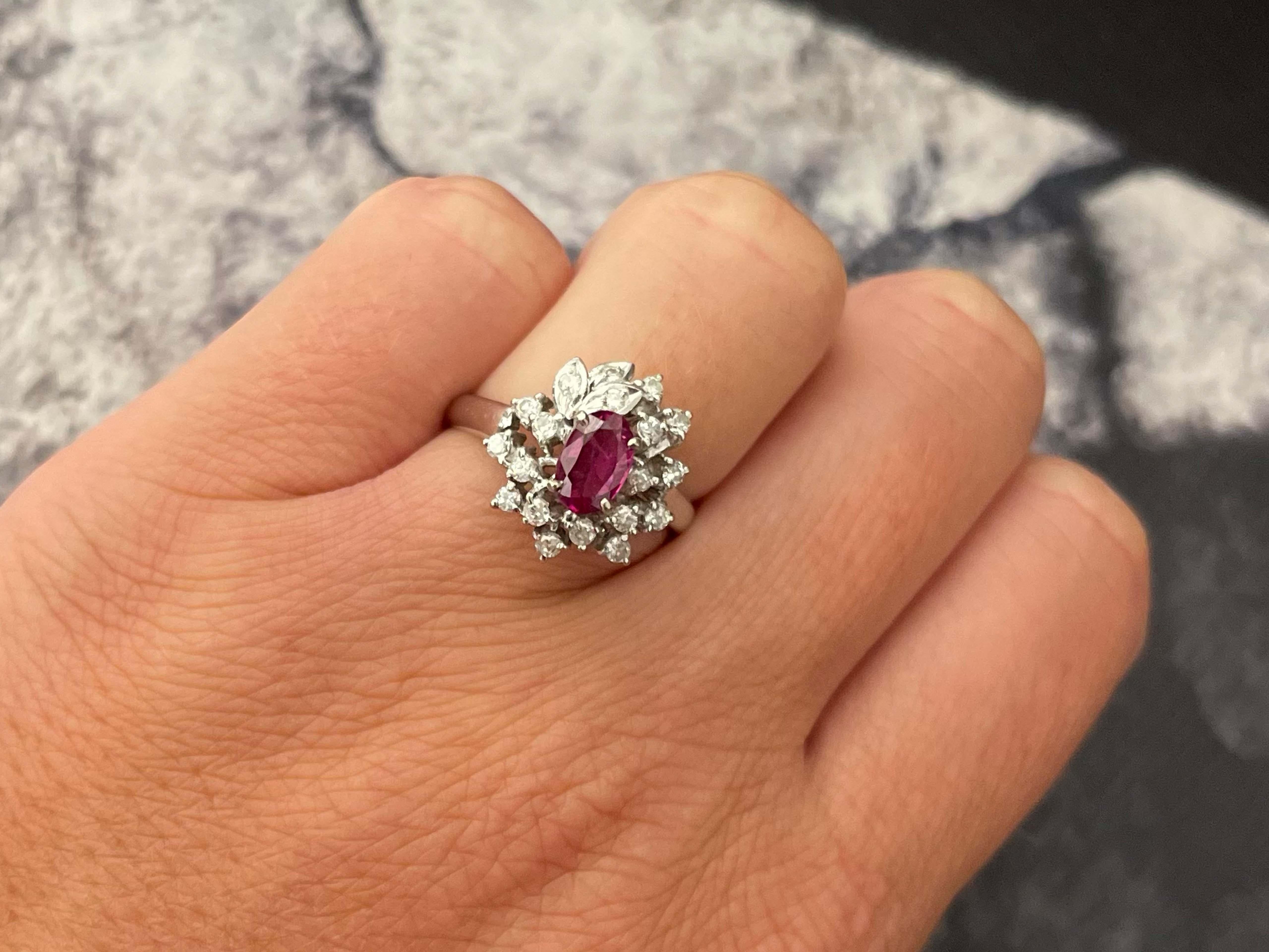 Item Specifications:

Metal: 14K White Gold

Style: Statement Ring

Ring Size: 7 (resizing available for a fee)

Total Weight: 4.2 Grams

Gemstone Specifications:

Gemstones: 1 red ruby

Ruby Carat Weight: 0.57 carats

Diamond Carat Weight: 0.15