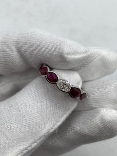 6.92 Carat Oval Ruby and Diamond East West Eternity Band Ring