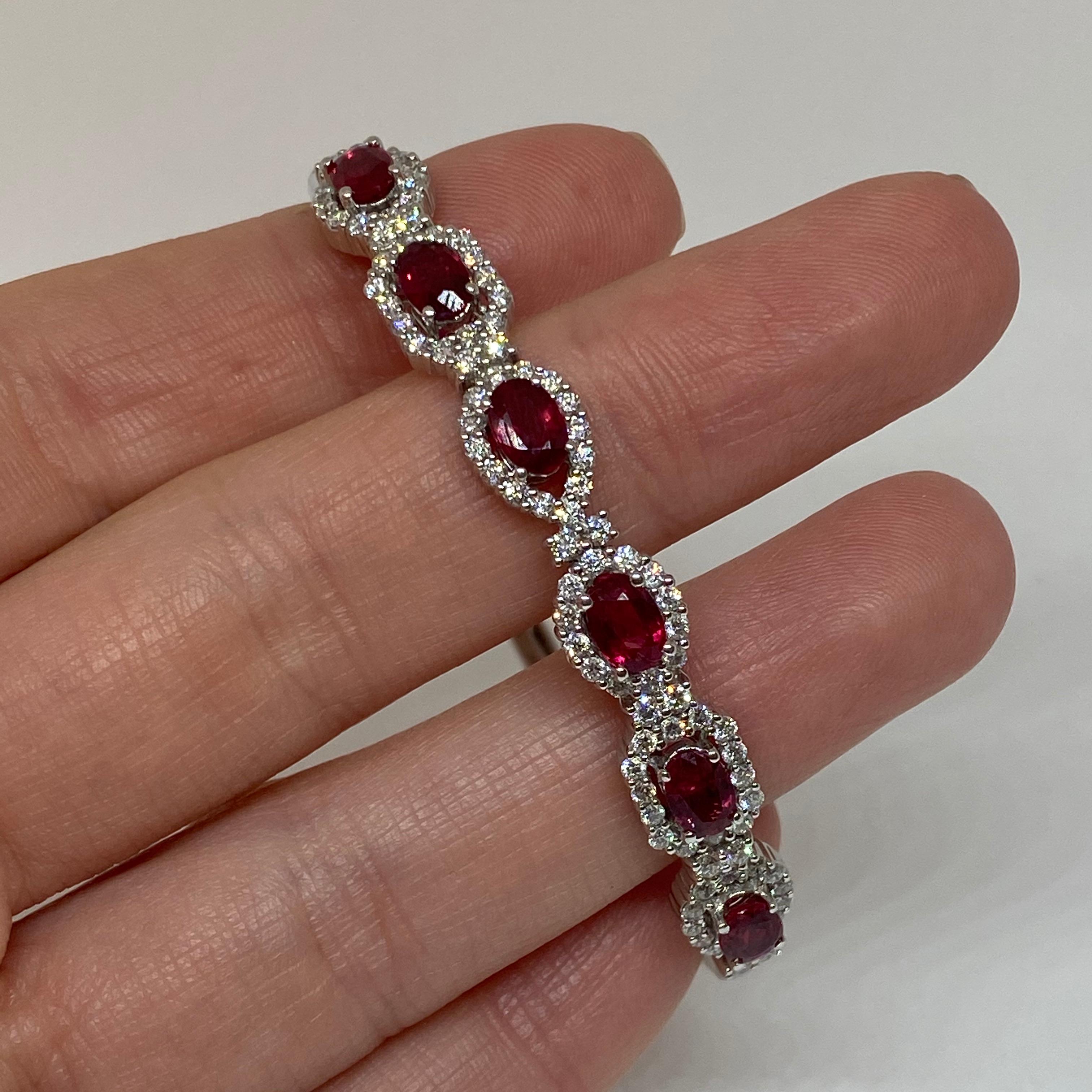 Oval Ruby and Diamond Halo Bangle Bracelet 14 Karat 3.37RTW 1.57DTW In New Condition In Carmel-by-the-Sea, CA