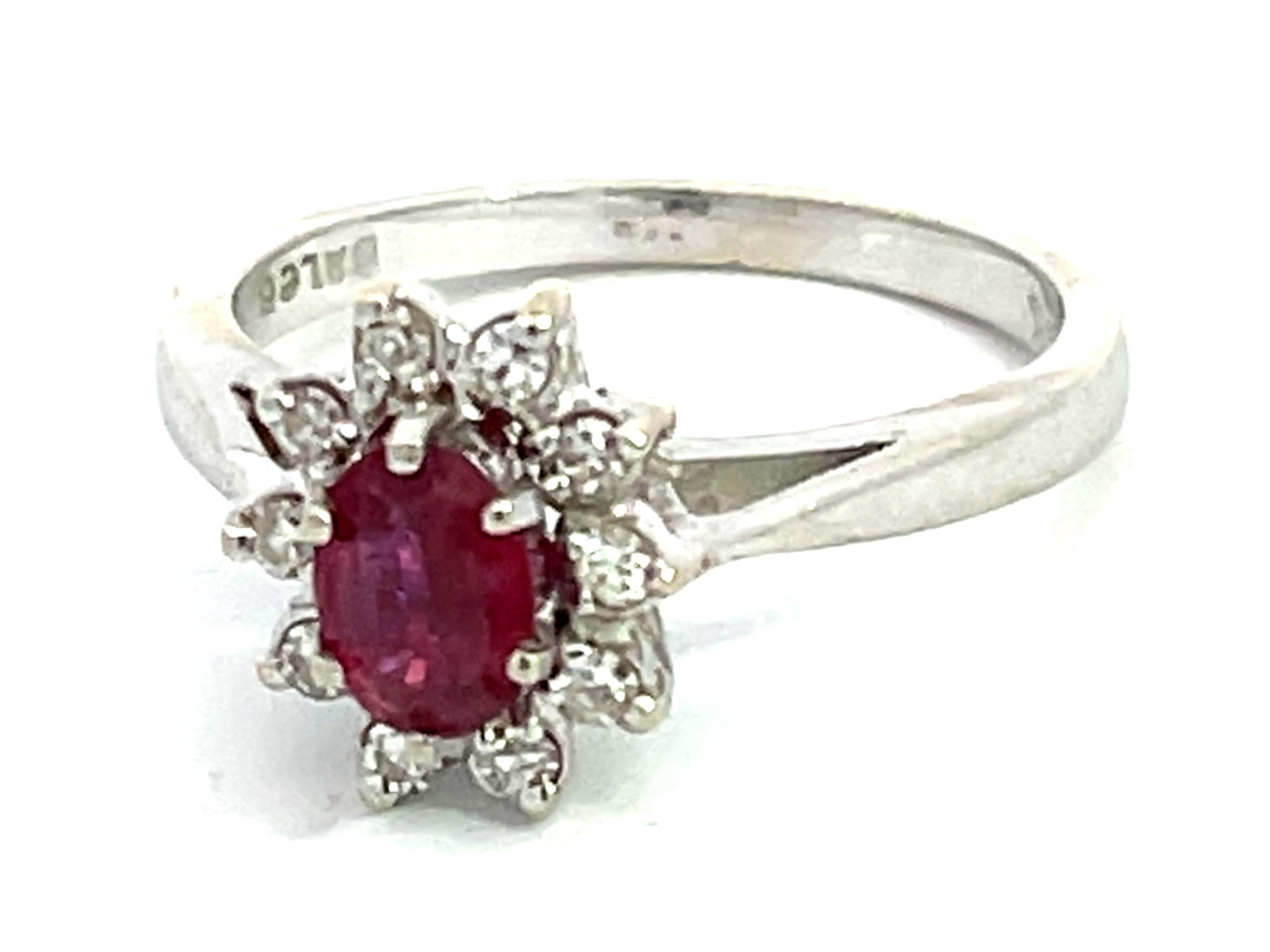 Oval Cut Oval Ruby and Diamond Halo Ring in 14k White Gold For Sale