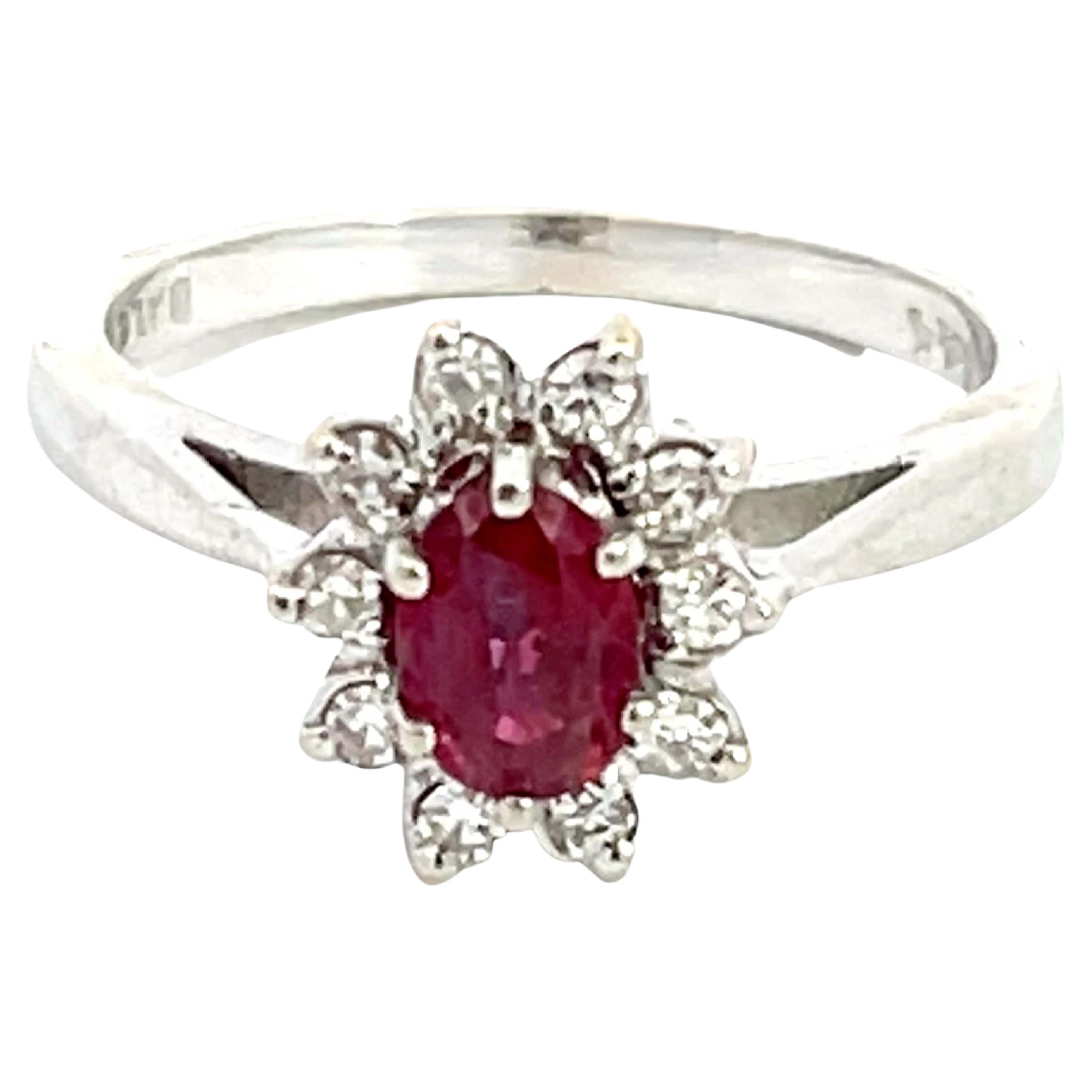 Oval Ruby and Diamond Halo Ring in 14k White Gold For Sale