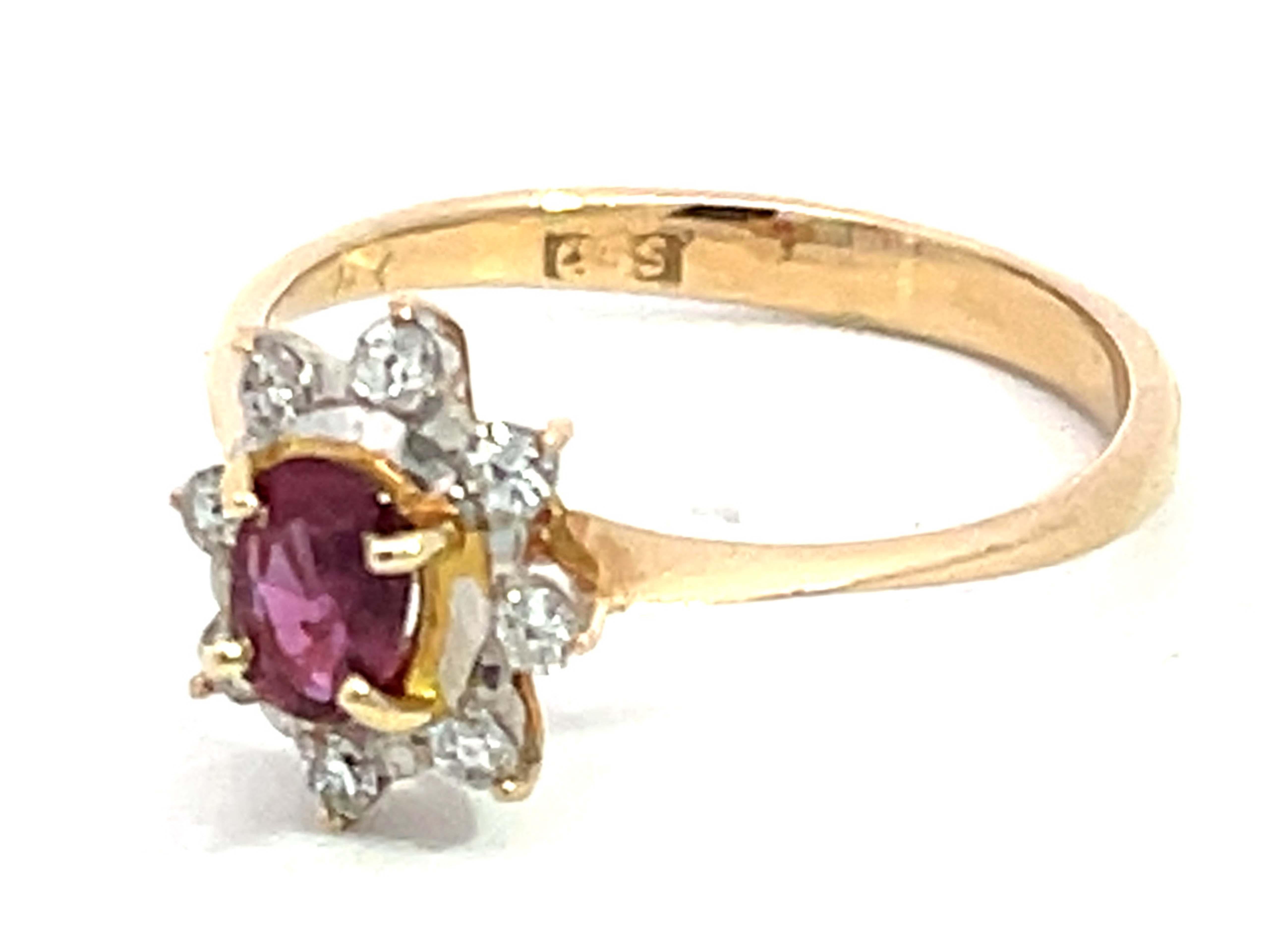 Brilliant Cut Oval Ruby and Diamond Halo Ring in 14k Yellow Gold For Sale
