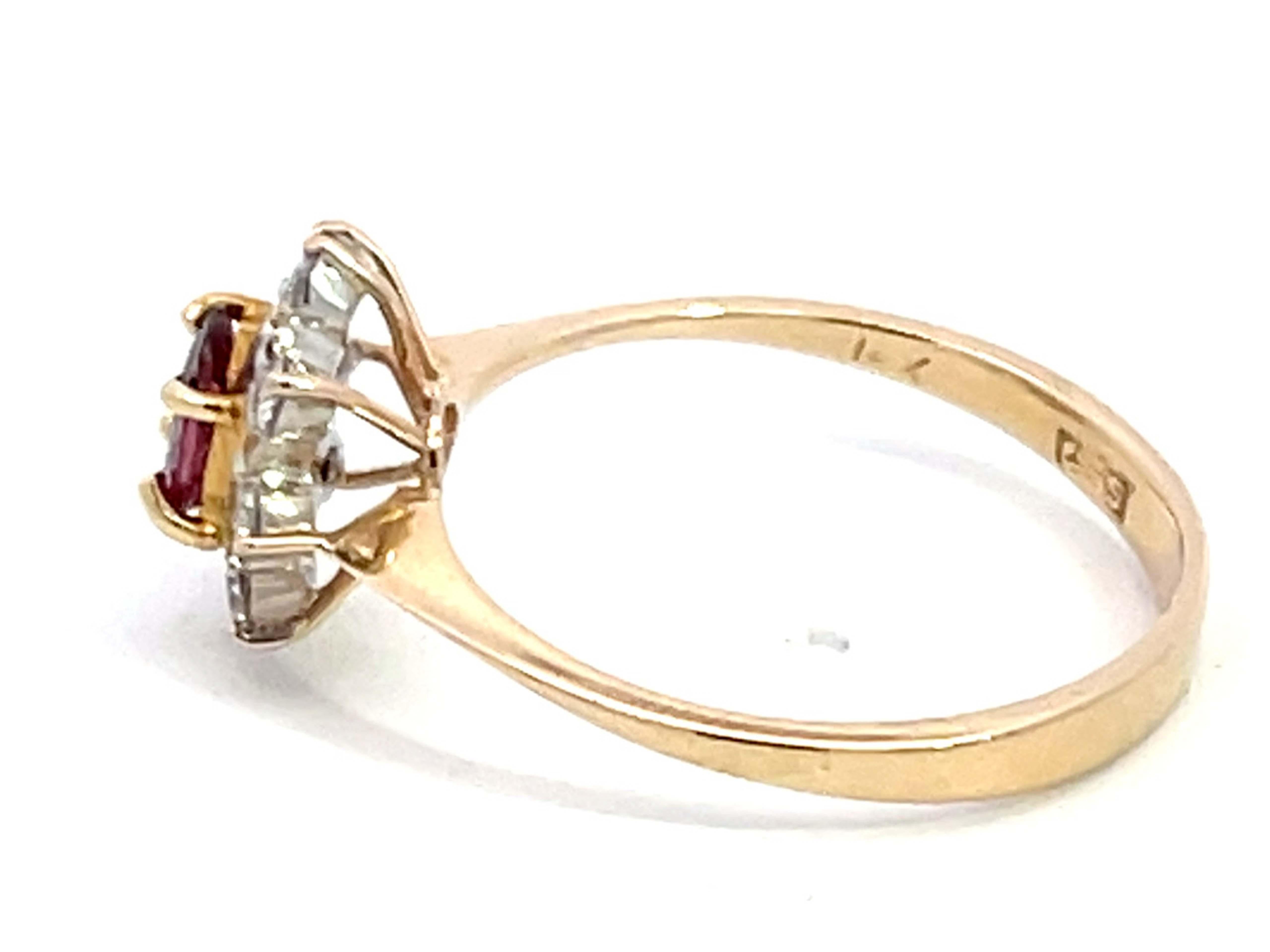 Women's Oval Ruby and Diamond Halo Ring in 14k Yellow Gold For Sale