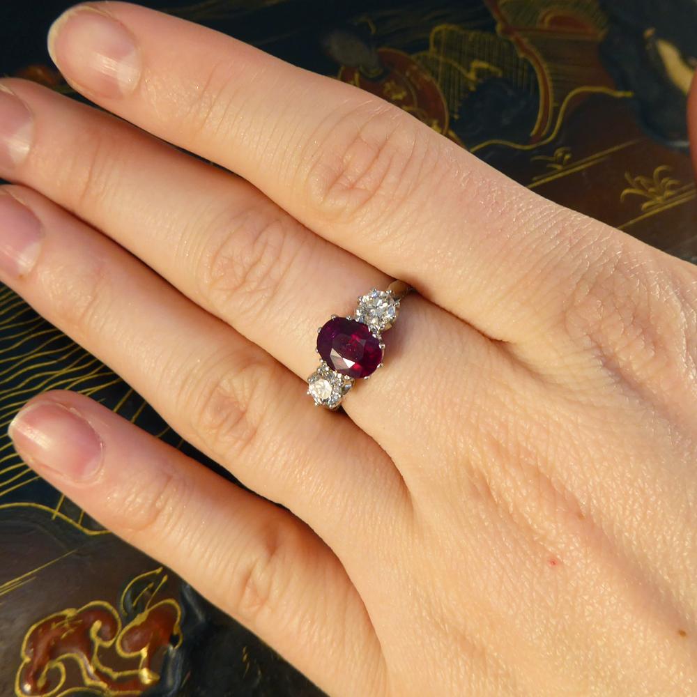 Oval Ruby and Diamond Three-Stone Engagement Ring in Platinum 4