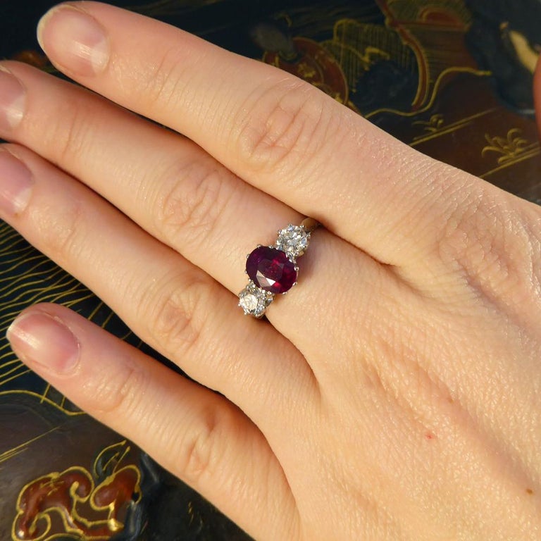 Oval Ruby and Diamond Three-Stone Engagement Ring in Platinum at 1stDibs