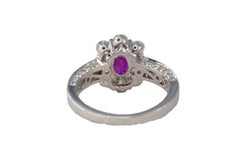 Oval Ruby and Multi-Cut Diamond Halo Ring