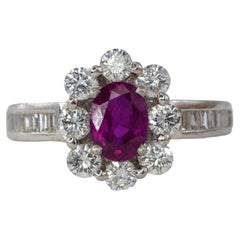 Oval Ruby and Multi-Cut Diamond Halo Ring
