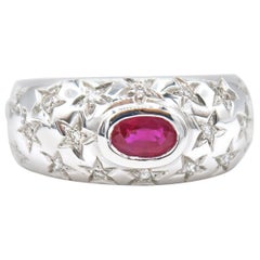 star engraved ring Oval Ruby and Star Engraved Diamond 18 Karat Gold Ring