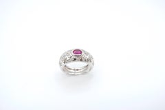 Oval Ruby and Star Engraved Diamond 18 Karat Gold Ring