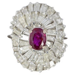 Oval Ruby and Tapered Baguette Diamond Ballerina Ring