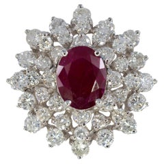 Oval Ruby and Tiered Brilliant-Cut Diamond Starburst Ring