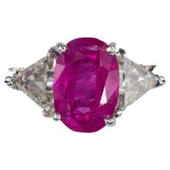 Oval Ruby and Trillion-Cut Diamond Three-Stone Ring