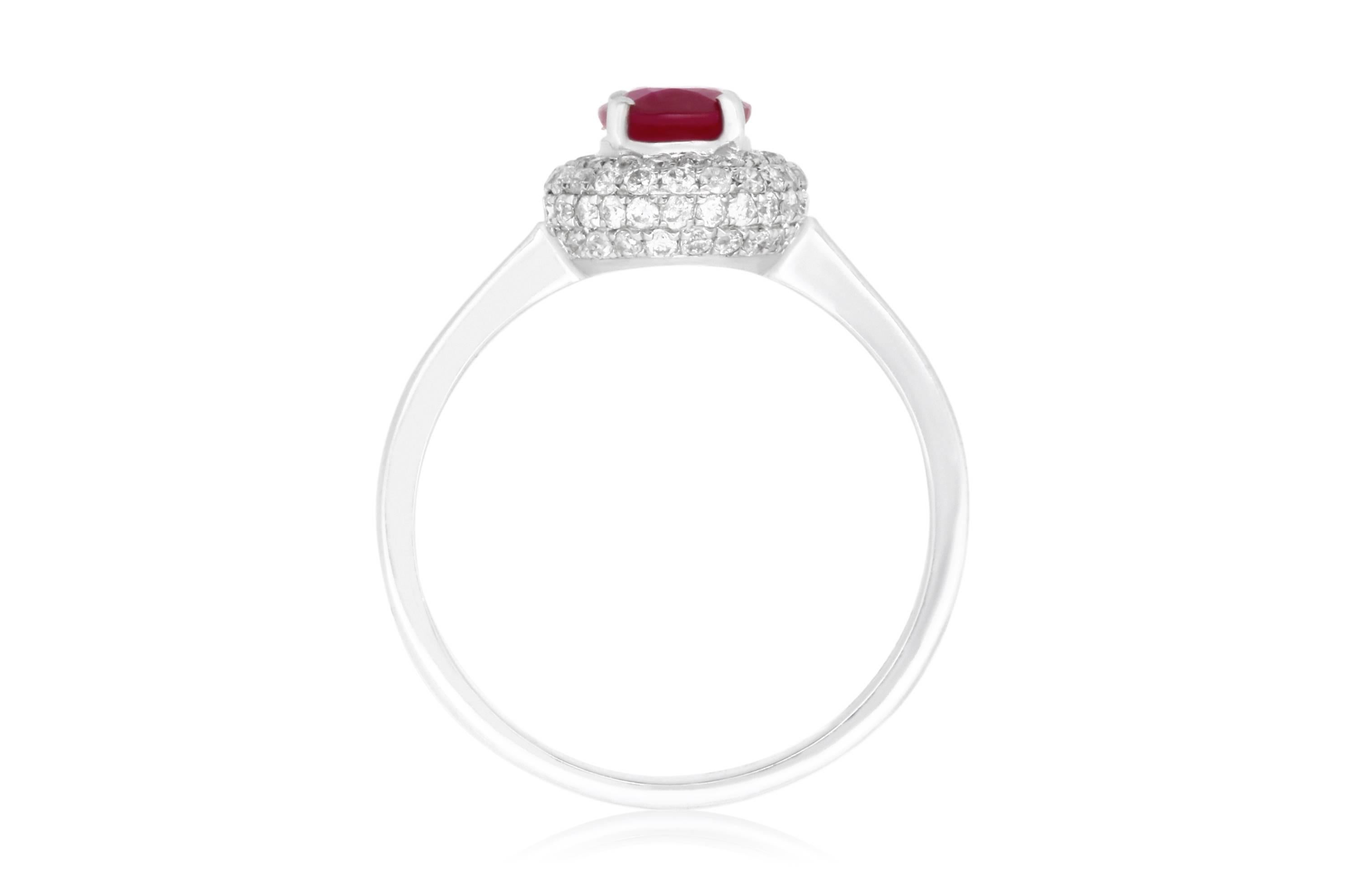 Material: 14k White Gold
Gemstones: 1 Oval Ruby at .78 Carats.
Diamonds: Brilliant Round White Diamonds at 0.90 Carats. SI Clarity / H-I Color. 
Ring Size: 6.5. Alberto offers complimentary sizing on all rings.

Fine one-of-a kind craftsmanship