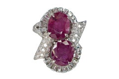 Oval Ruby Bypass Cocktail Ring with Baguette and Round Diamond Accents