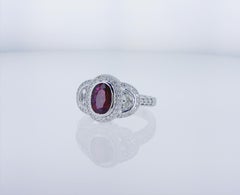 Oval Ruby Cocktail Ring with Half Moon Diamond Accents