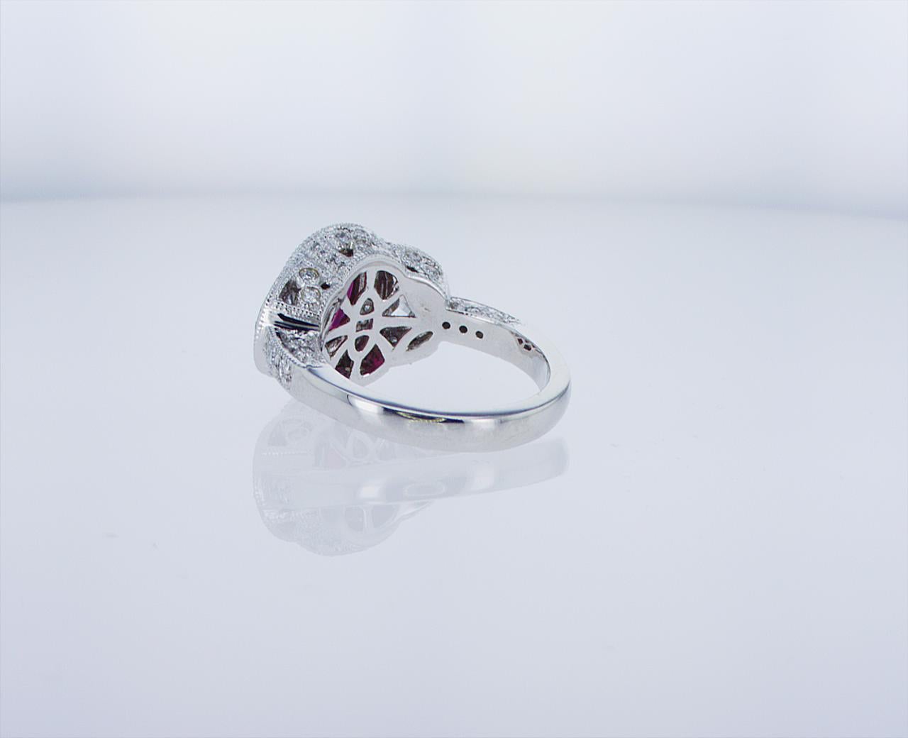 Oval Ruby Cocktail Ring with Half Moon Diamond Accents For Sale 1