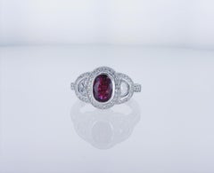 Oval Ruby Cocktail Ring with Half Moon Diamond Accents
