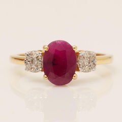 Anello ovale con diamante e rubino in oro massiccio 14K (certificato)
