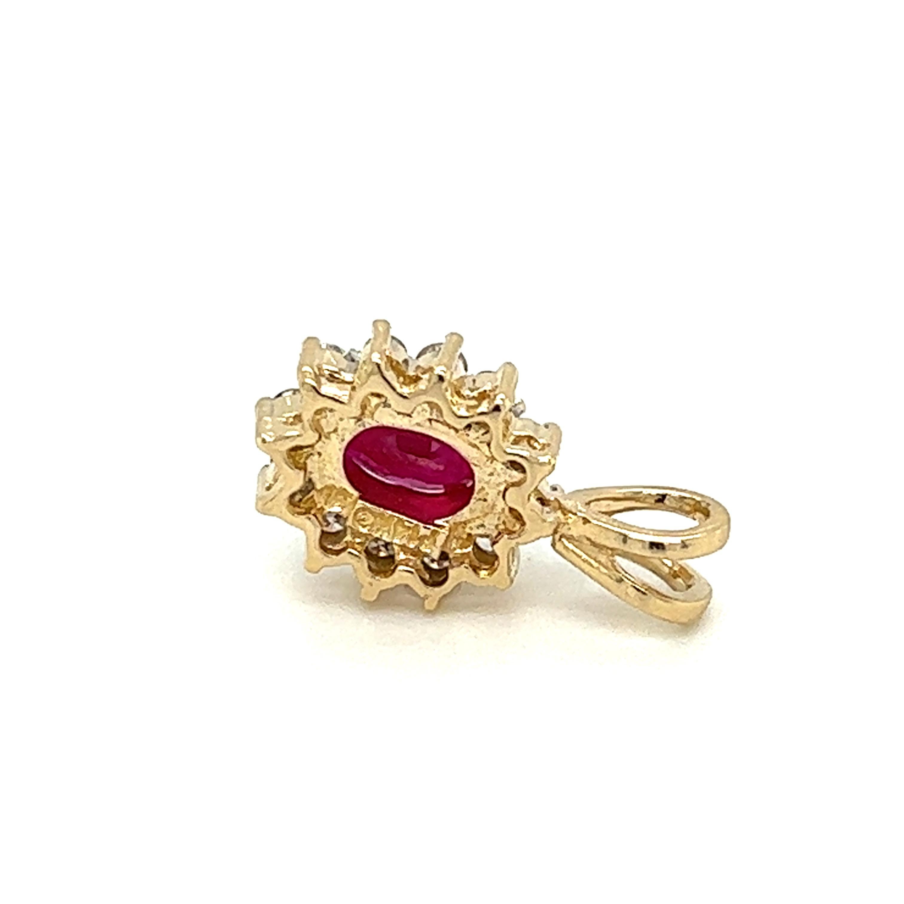 Contemporary Oval Ruby & Diamond Halo Pendant in 14K Yellow Gold 
