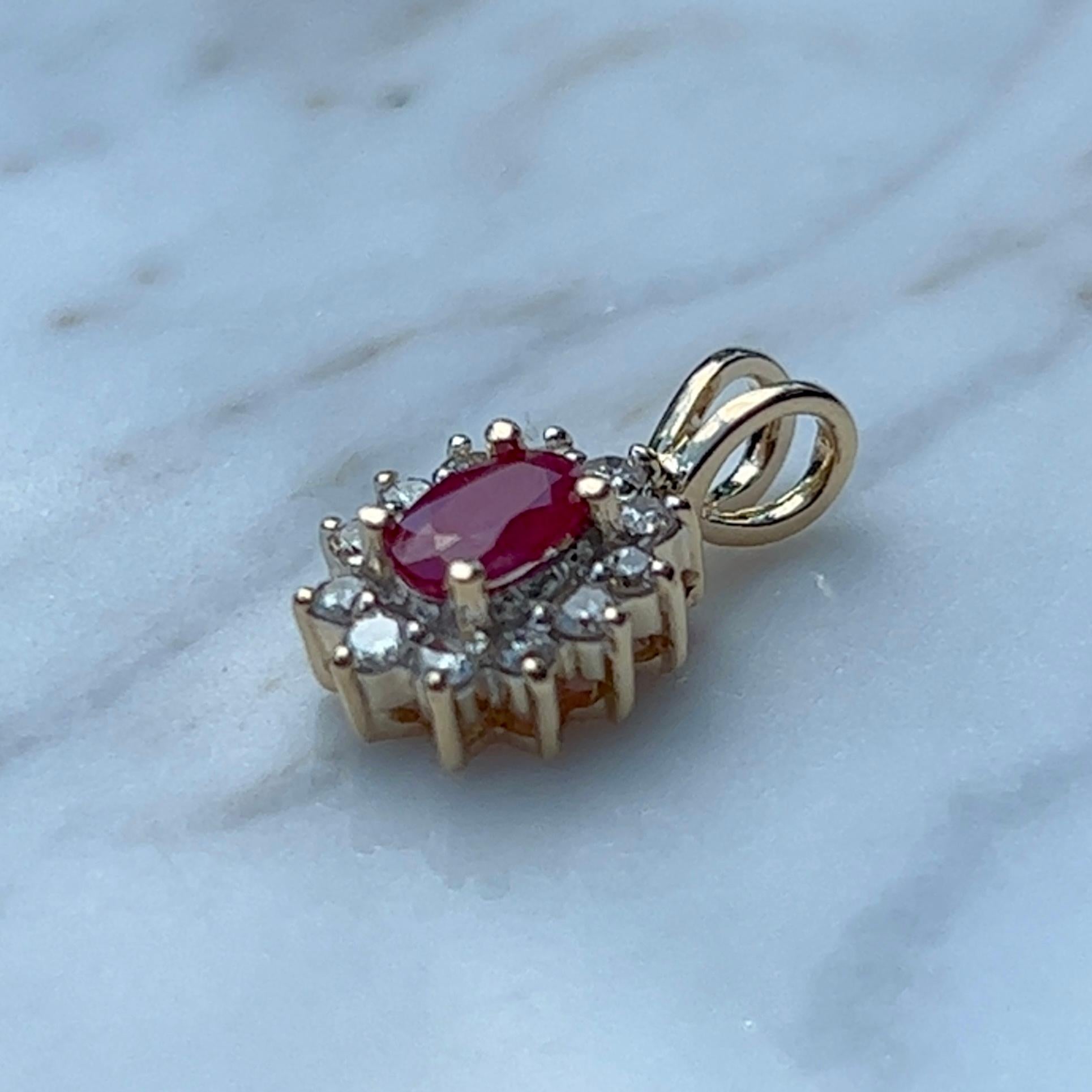 Oval Cut Oval Ruby & Diamond Halo Pendant in 14K Yellow Gold 