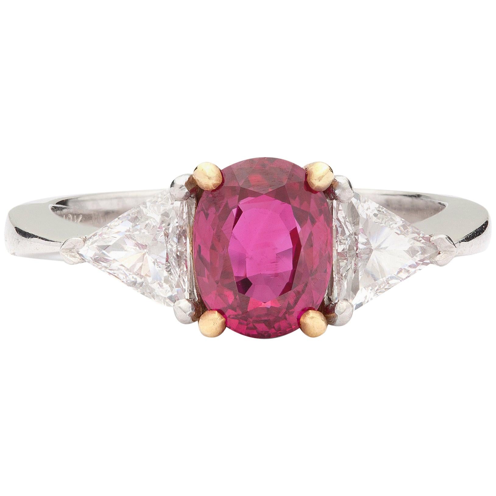 Oval Ruby, Diamond, Platinum and Yellow Gold Ring