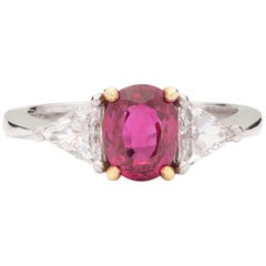 Oval Ruby, Diamond, Platinum and Yellow Gold Ring