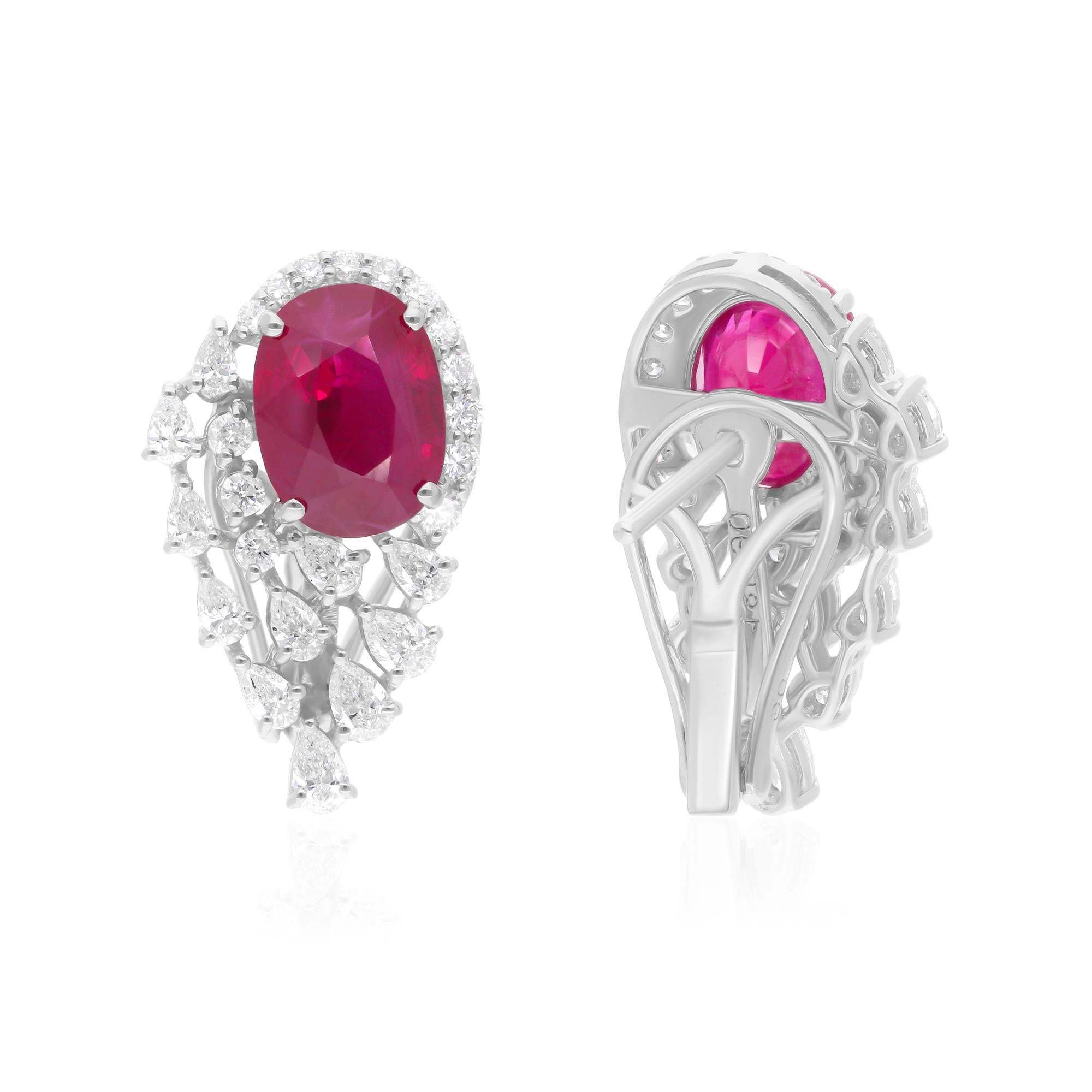 Cast from 14-karat gold, these exquisite earrings are handset with 4.46 carats Ruby and 1.16 carats of sparkling diamonds.

FOLLOW SPECTRUM JEWELS storefront to view the latest collection & exclusive pieces. Spectrum Jewels is proudly rated as a Top