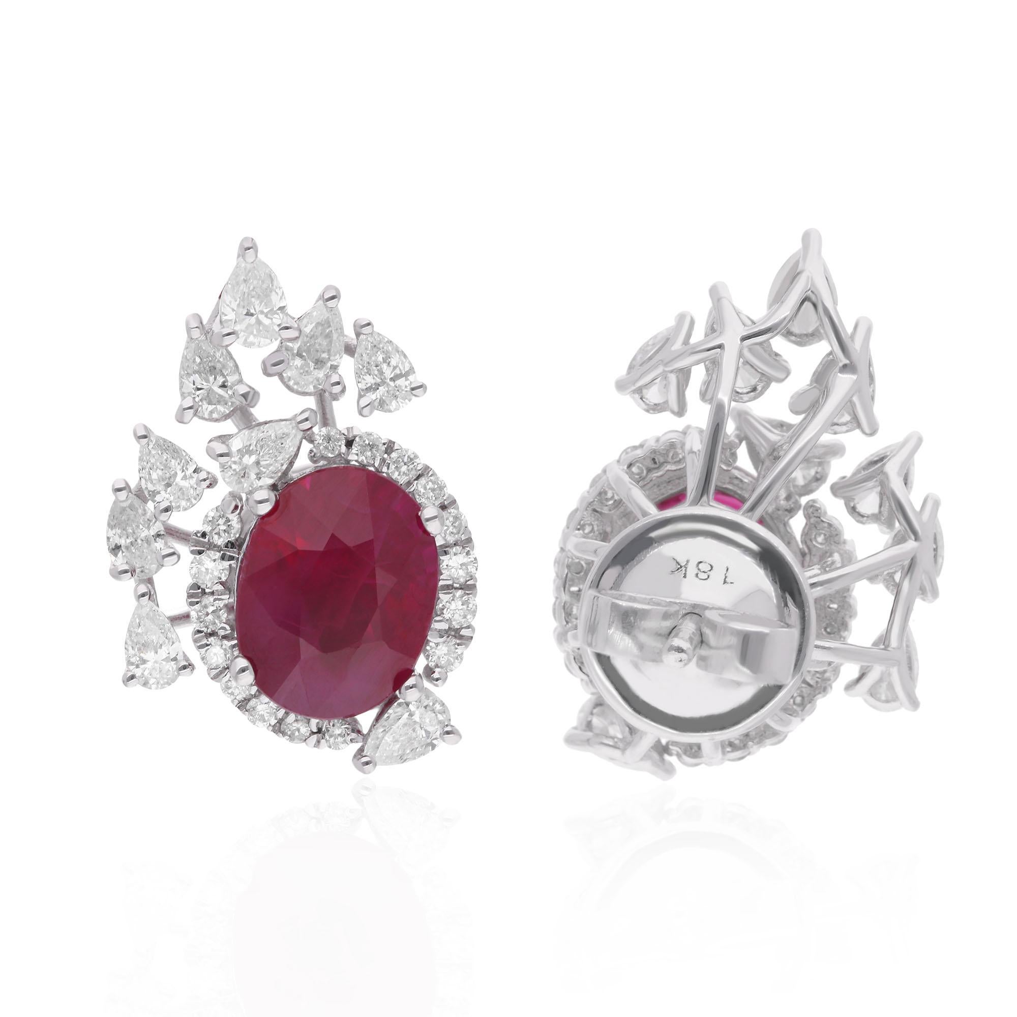 Adorn your ears with the timeless elegance of our Oval Ruby Gemstone Stud Earrings, a captivating blend of sophistication and luxury. Handcrafted with meticulous care from 18 karat white gold, these earrings feature exquisite oval ruby gemstones
