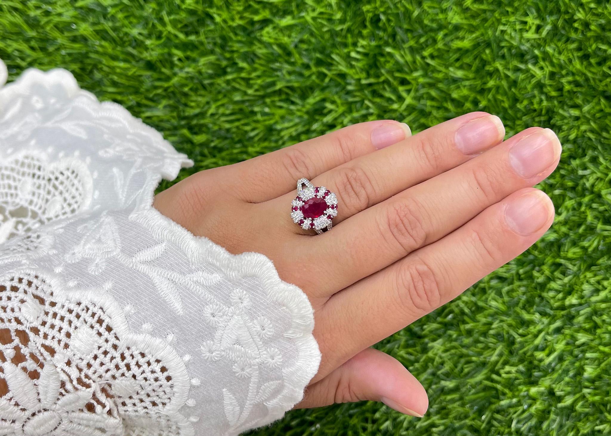 It comes with an appraisal by GIA G.G.
Total Carat Weight of Rubies = 2.04 Carats
Total Carat Weight of Diamonds = 0.92 Carats
Diamonds Color is F-G
Diamonds Clarity is VVS-VS
Metal is 18K White Gold
Ring Size = 6 US
It can be resized complimentary 