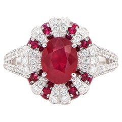Retro Oval Ruby Ring 2.04 Carats Set with Diamonds 0.92 Carats 18k White Gold
