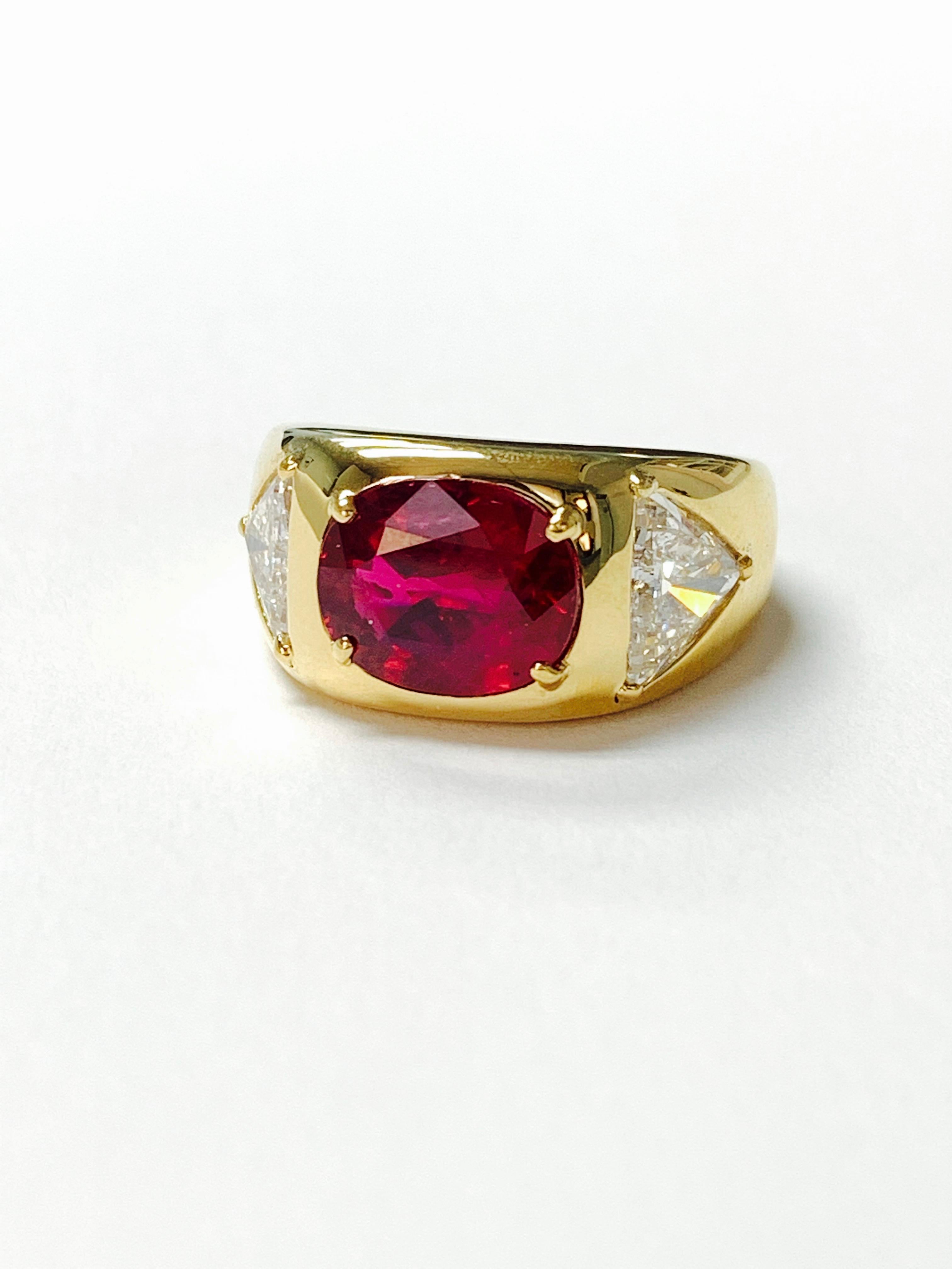 Oval Ruby Ring and trillion diamond engagement ring in 18k gold, AGL certified. 
The details are as follows : 

Oval Ruby weight : 2.78 carat 
Trillion diamond weight : 1.50/2 
Metal : 18k yellow gold 
Ring size : 6 3/4 
Dimensions :