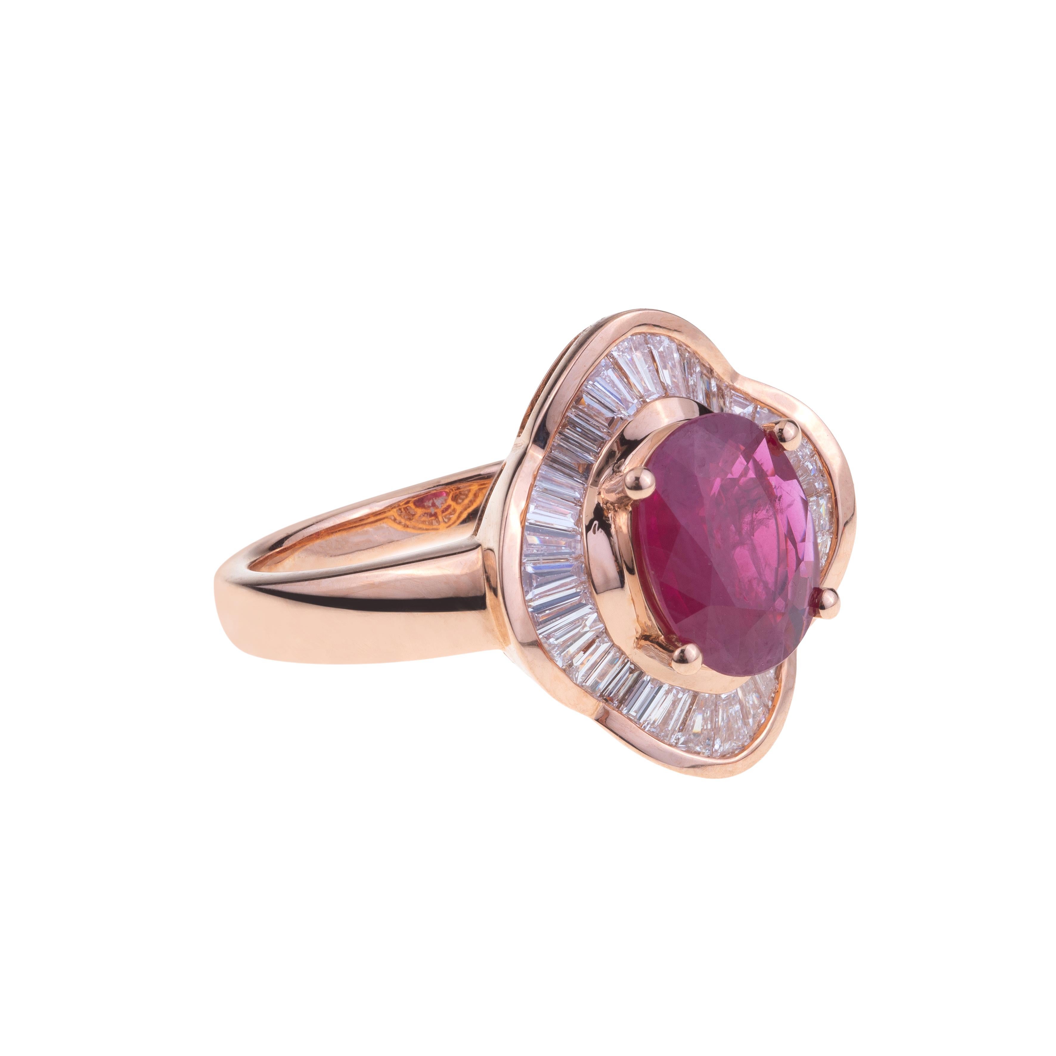 Oval Ruby Ring Rose Gold Set with Baguette Diamonds.
The Ring is Dominated by an Exceptional  Red Ruby ct. 1.56 Oval Cut , set with Rose Gold and Baguette cut Diamonds ct. 0.65 VVS. The weight of the 18kt gold is gr. 6.26.
Designed in Italy.
