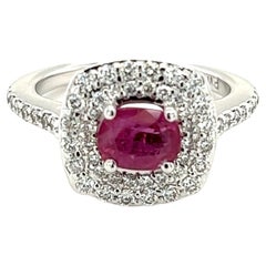 Oval Ruby Set East / West in Diamond Halo