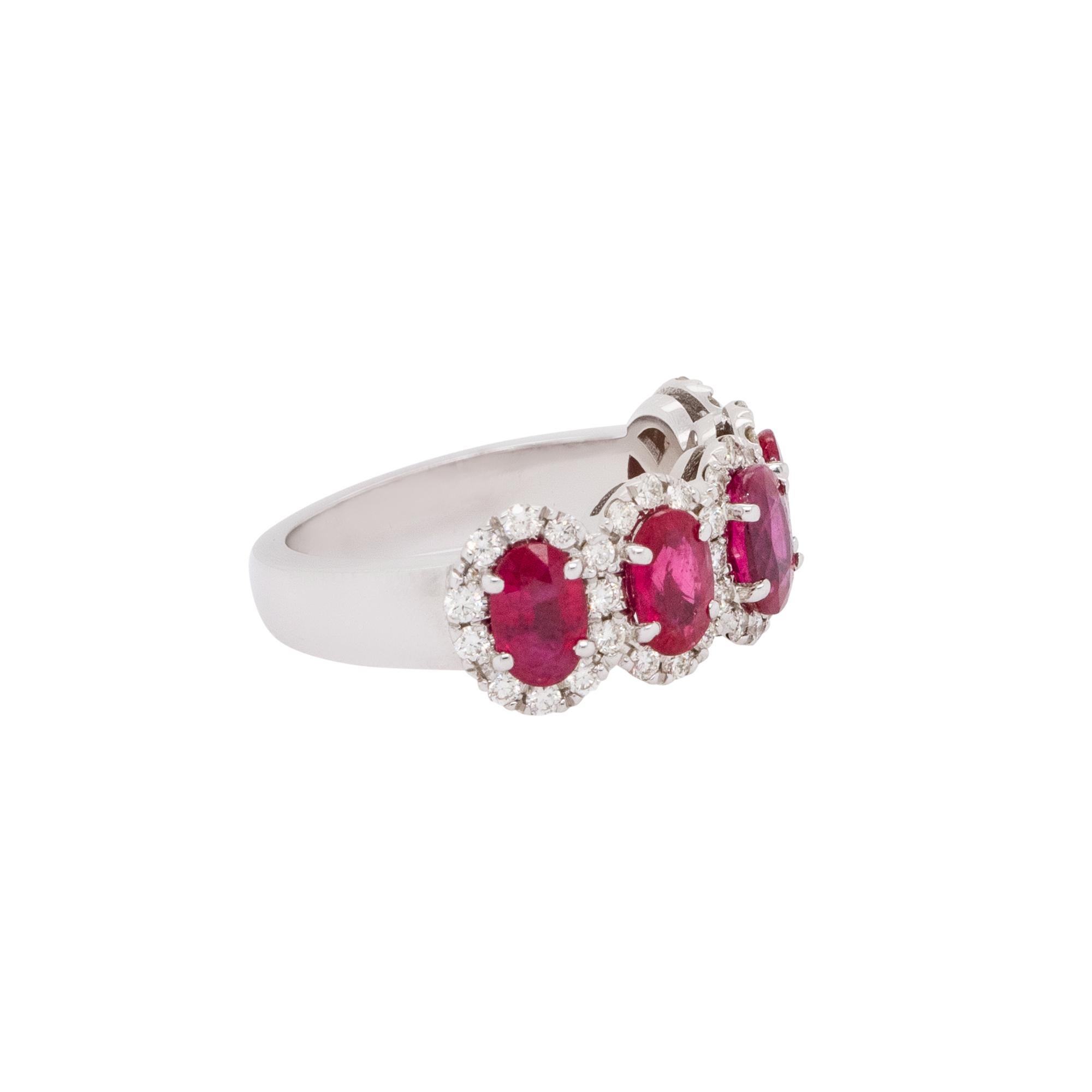 Oval Cut Oval Ruby with Diamond Halo Five Stone Ring 18 Karat in Stock For Sale