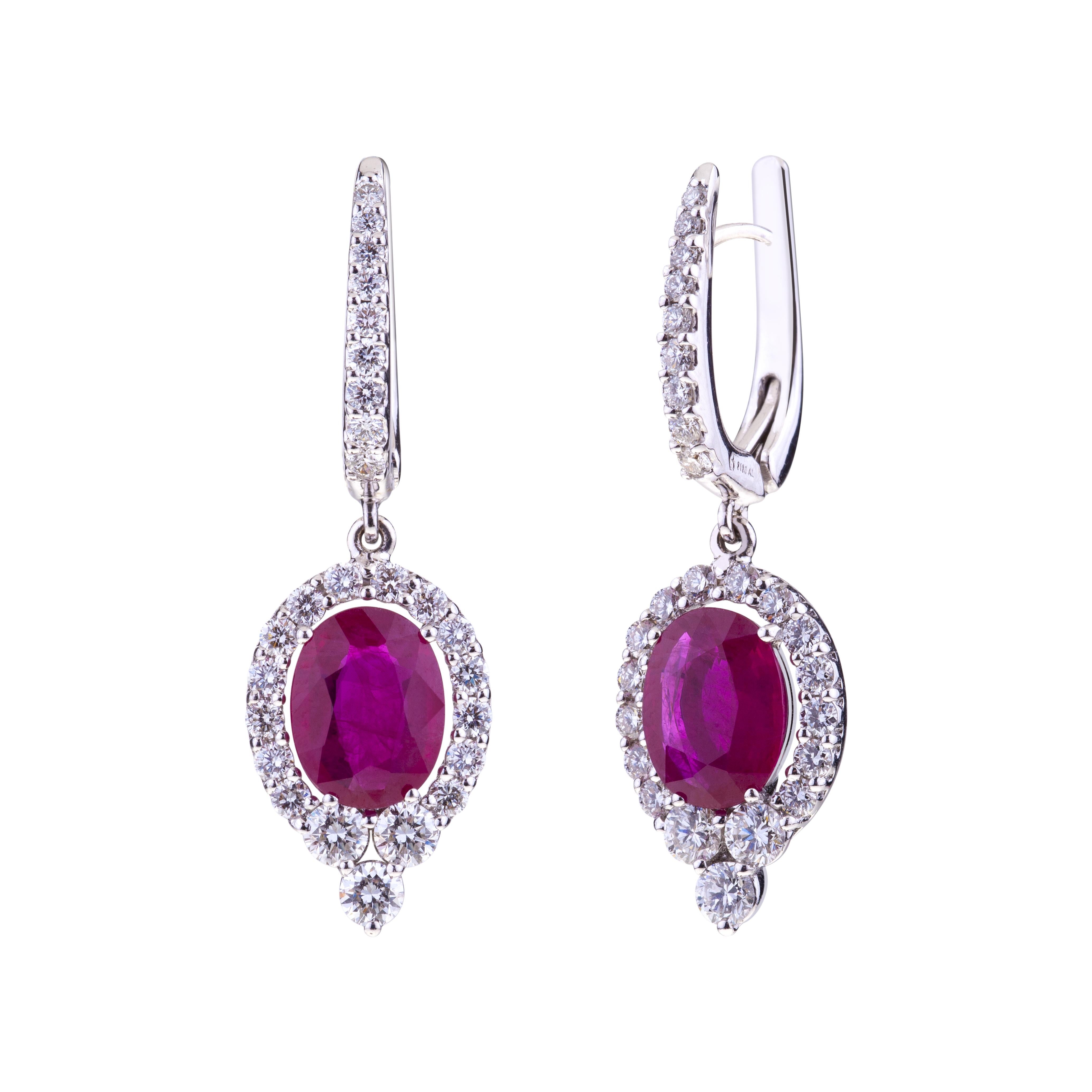 Contemporary Oval Ruby with Round Diamonds White Gold Pendant Earrings For Sale