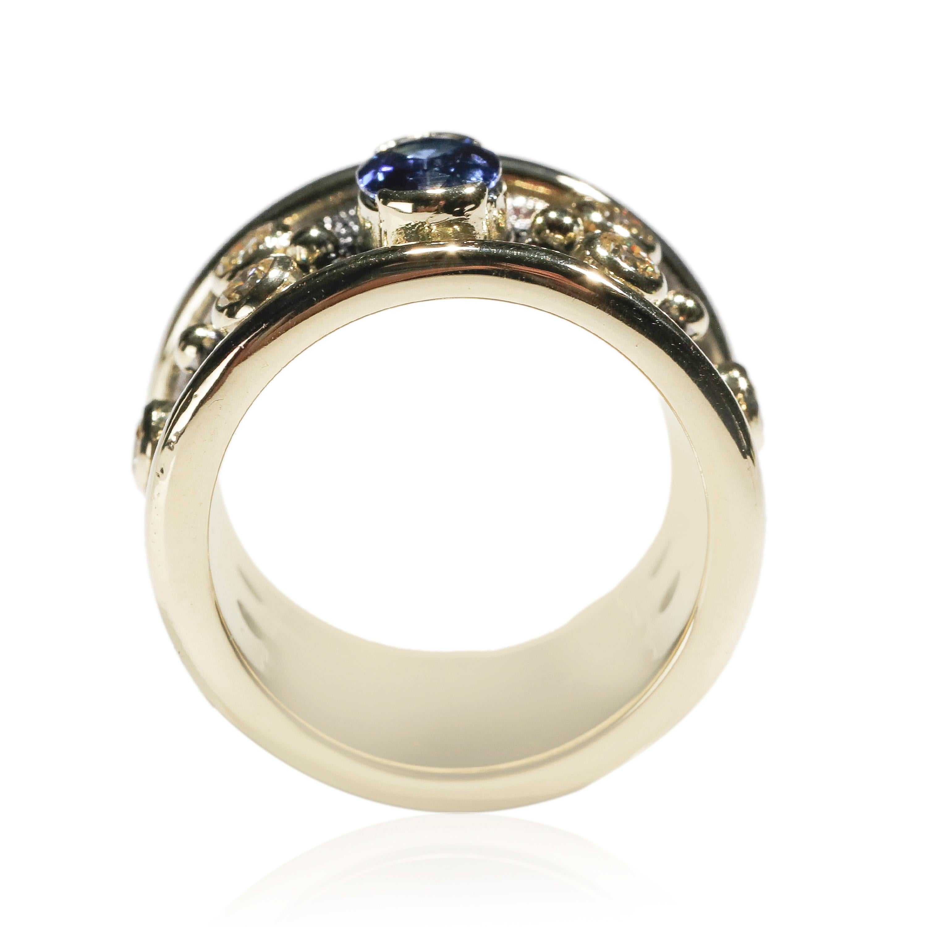 Oval Sapphire 1 Ct Diamond 18k Yellow Gold Cigar Band Ring US Size 6

Crafted in 18 kt Yellow Gold, this Unique design showcases a white Diamond 1 TCW Round-shaped diamonds, set in yellow gold, fine oval shape mesmerizing 0.5 ct sapphire, Polished