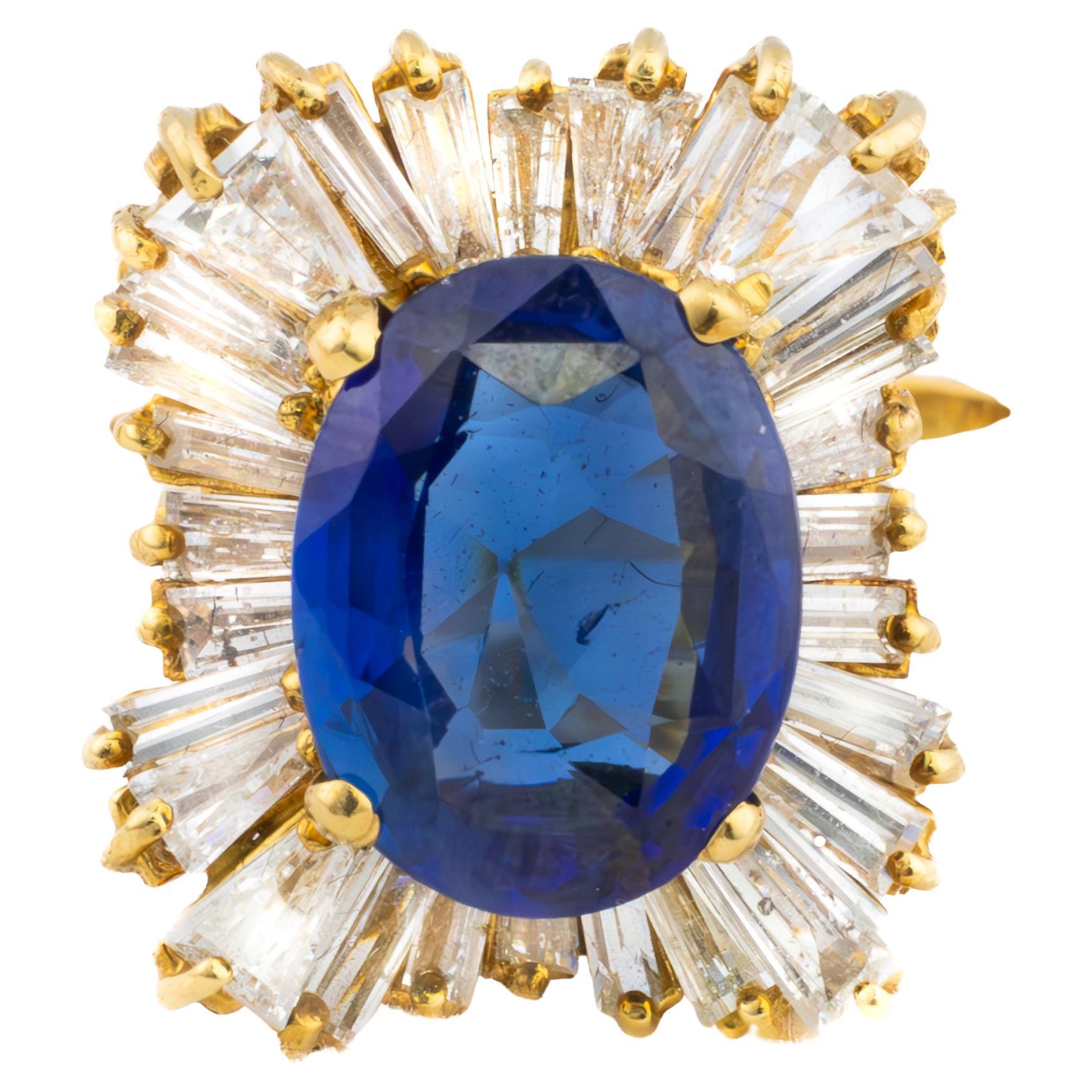 Bague saphir ovale et diamant baguette en vente