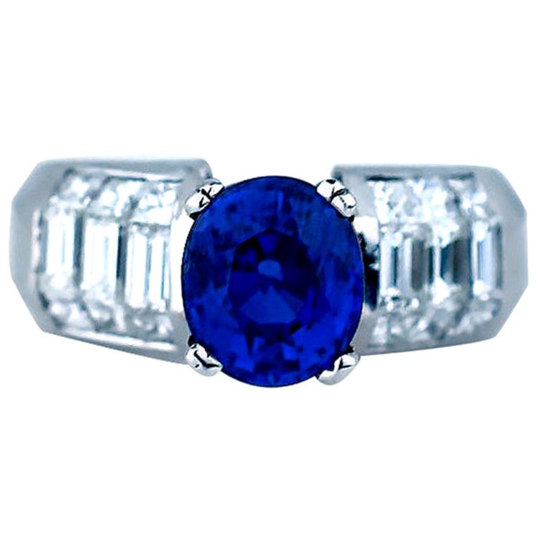 Oval Sapphire and Diamond Baguette Invisible Ring 4.89 Carat For Sale