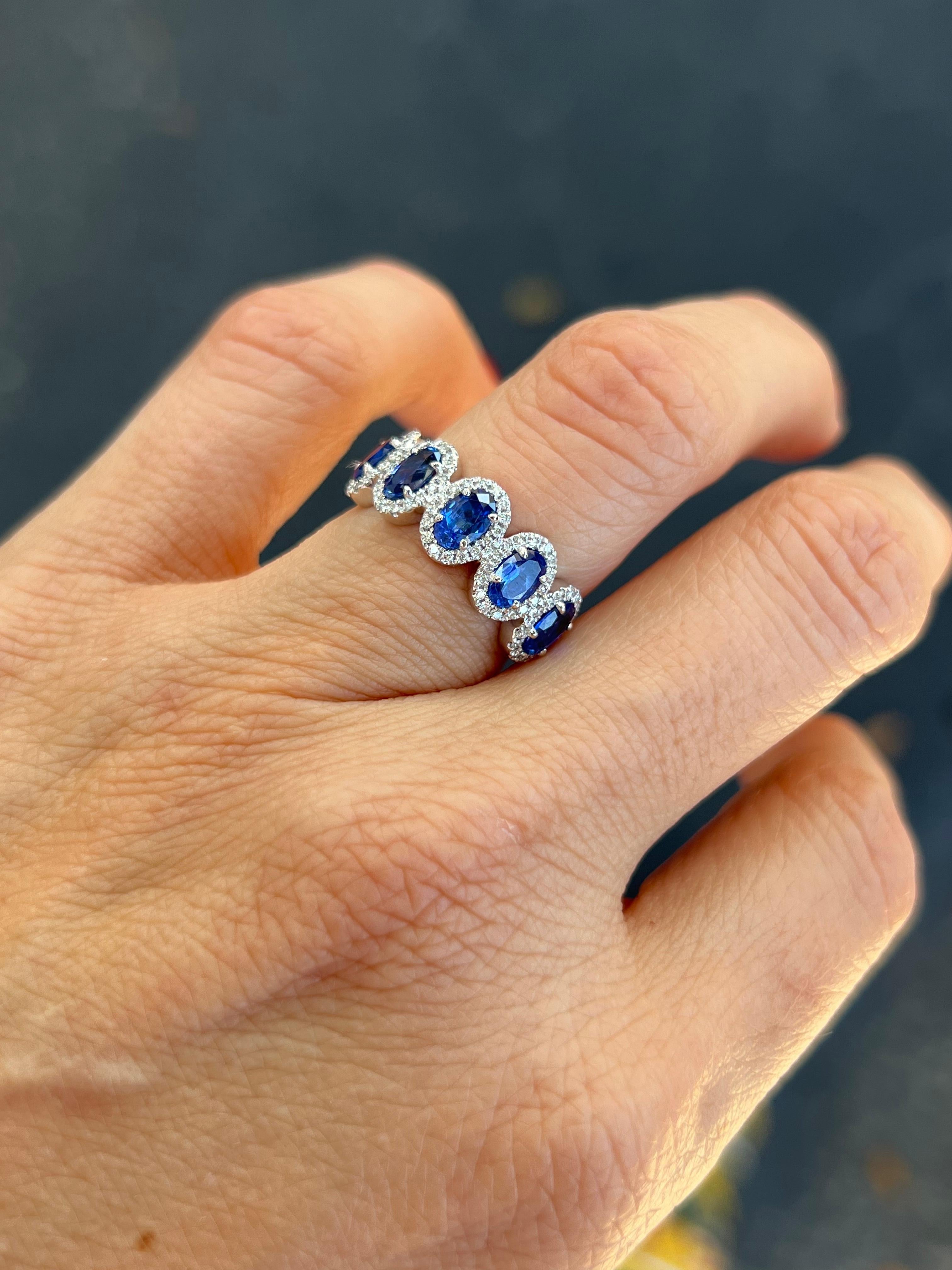 Contemporary Oval Sapphire and Diamond Band Ring on Platinum For Sale