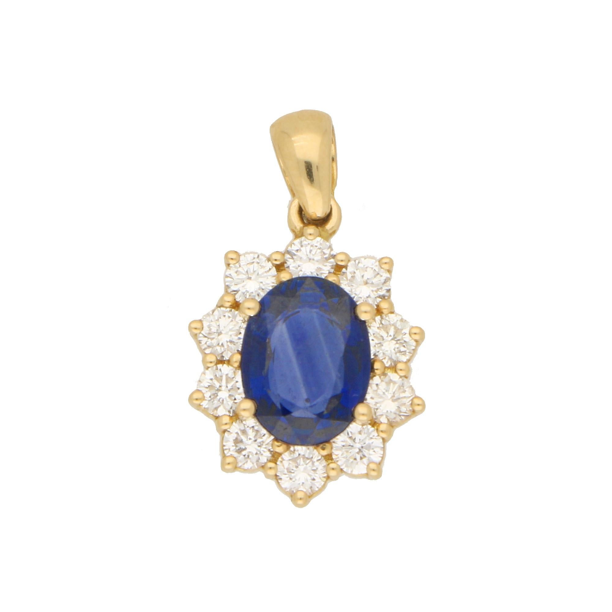 Oval Cut Oval Sapphire and Diamond Cluster Pendant in 18 Karat Yellow Gold