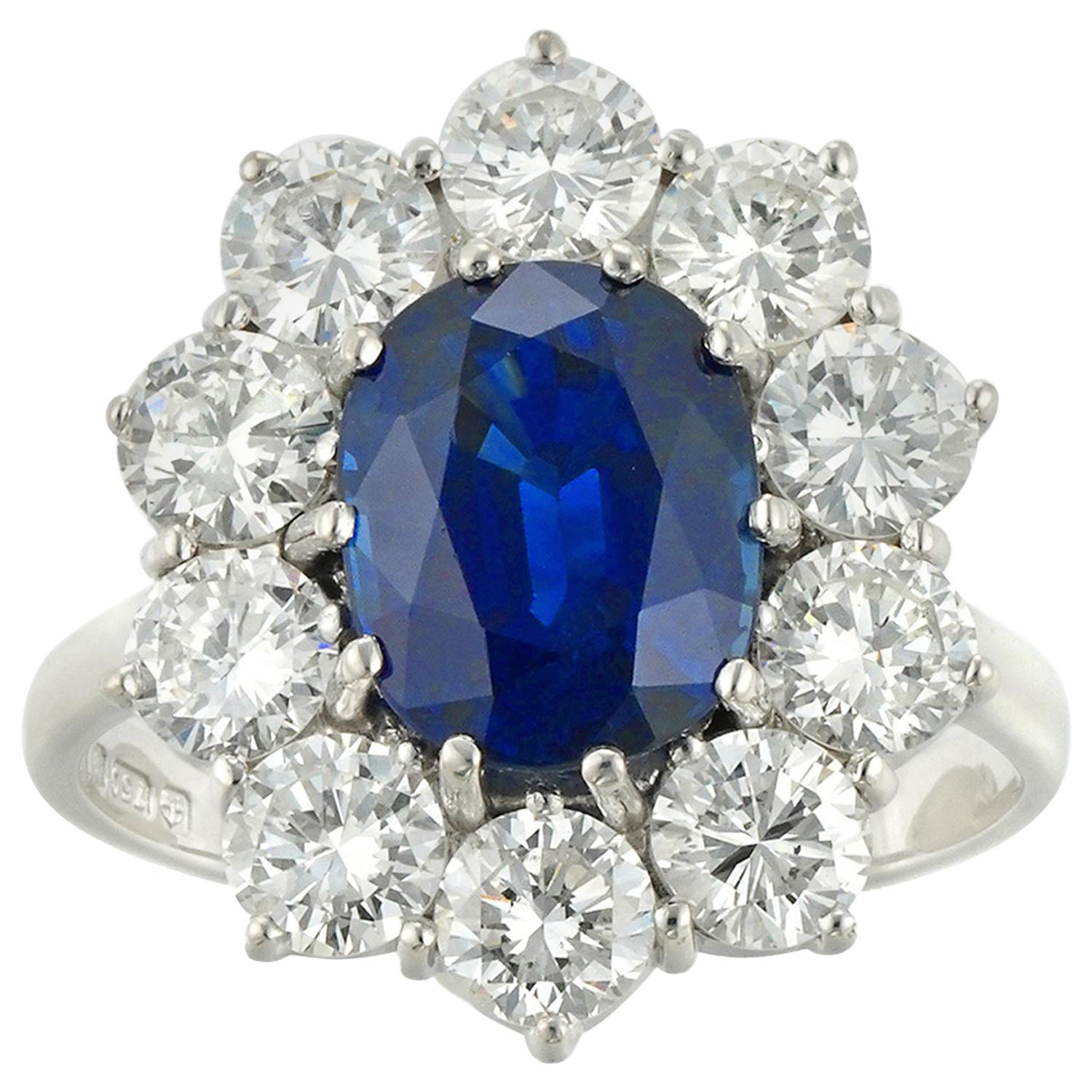 GCS Certified 3.74 Carat Oval Sapphire and Diamond Cluster Ring