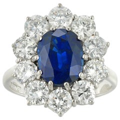 Vintage GCS Certified 3.74 Carat Oval Sapphire and Diamond Cluster Ring