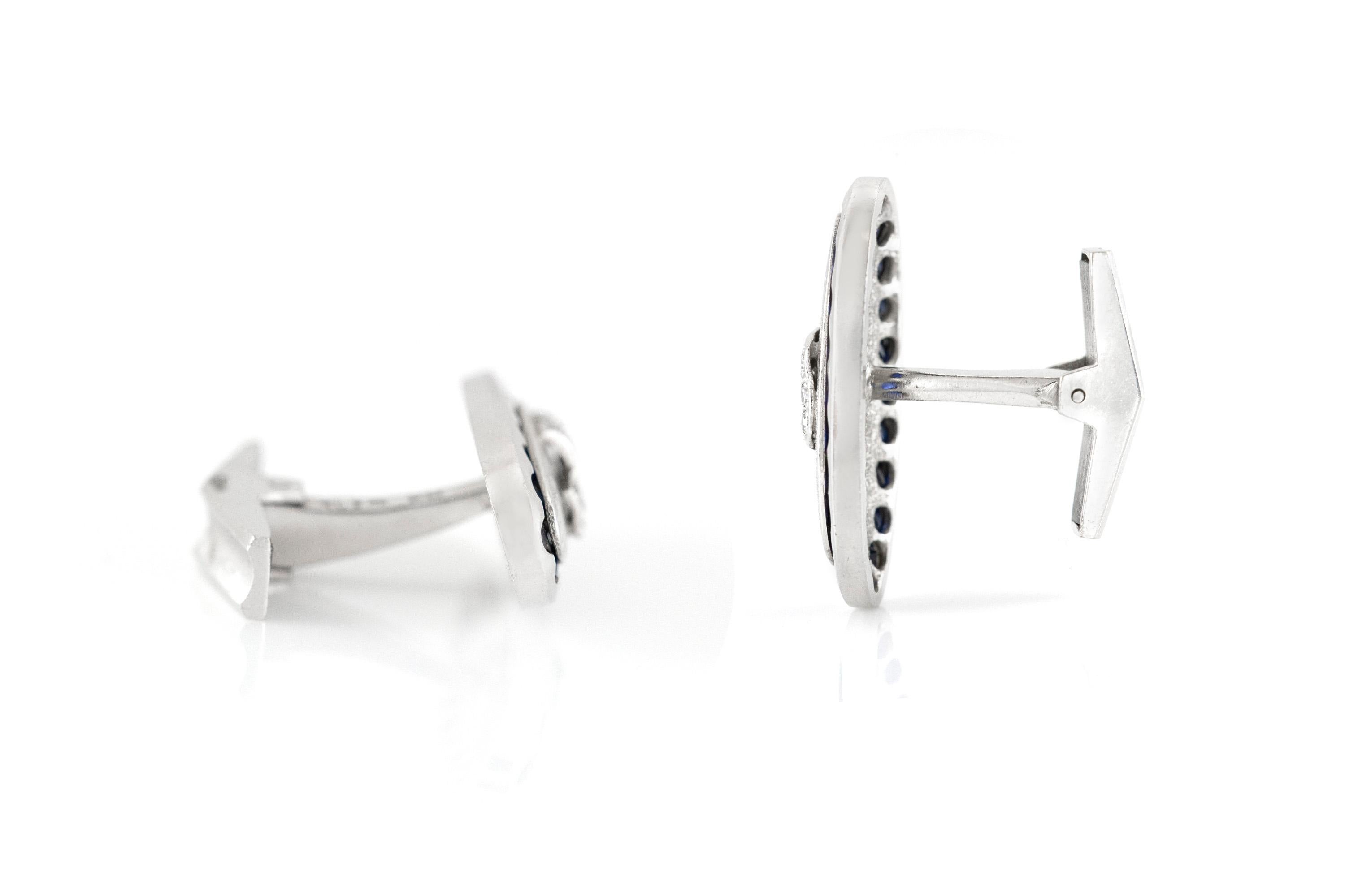 Cufflinks finely crafted in 14k white gold, weighing 4.2 dwt., diamons weighing 0.60 karat, size of each cufflink is 1.75 inch. Circa 1970.