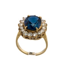 Oval Sapphire and Diamond Halo Ring